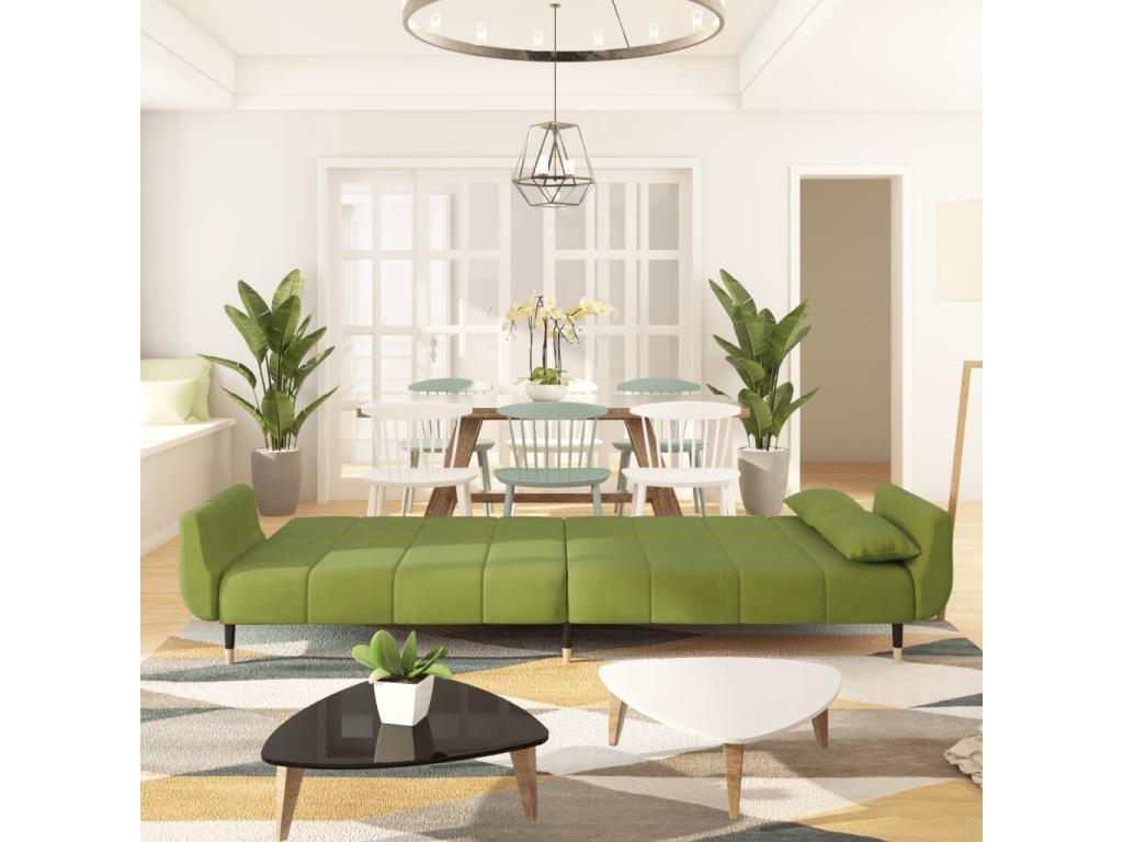 2-seater sofa bed with two pillows, light green velvet